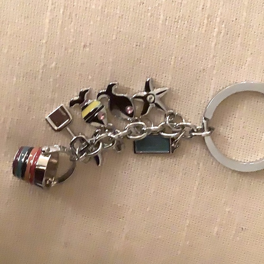 Authentic Coach Keyring NWOT featuring enameled sand bucket with shovel, so cute